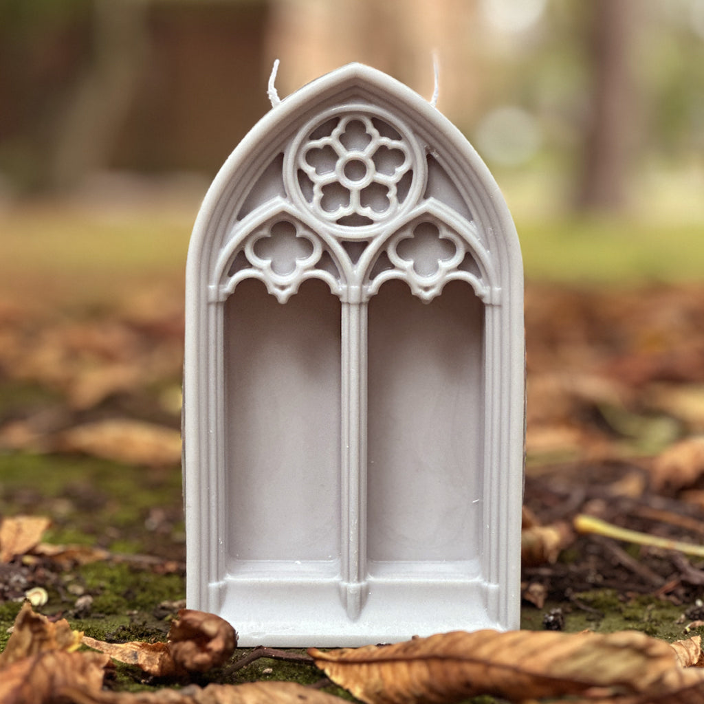 This gorgeously gothic arch candle makes the perfect centrepiece! The serene light grey colour conjures up medieval stone vibes, and it would make a charming addition to your home decor - it's too beautiful to burn! (Even if it does have two wicks!)