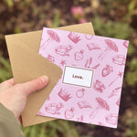 Load image into Gallery viewer, Show your affection with stationery! Our &#39;Love&#39; greetings card is the perfect year-rounder! Valentine&#39;s, Galentine&#39;s, Birthdays, Weddings and anniversaries, this quirky card is the perfect addition to our greetings card collection. Complete with kraft paper envelope and blank inside for your message - each of our cards arrives packed in a sealed compostable bag.
