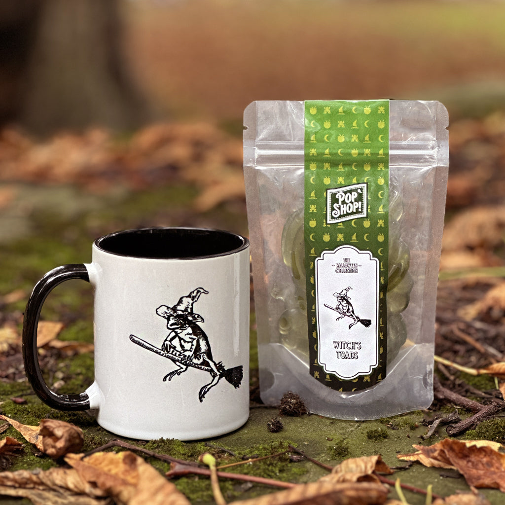 Our magical mascot Winnie the Wiz has her very own mug! Stir up your own personal potion with our 'Witch's Brew' mug gift set, perfect for warming up with this season! This gift set contains our 'Winnie ceramic mug' (11oz/330ml) and a pouch of 'Witch's Toads' (160g) - conjuring up the perfect treat!