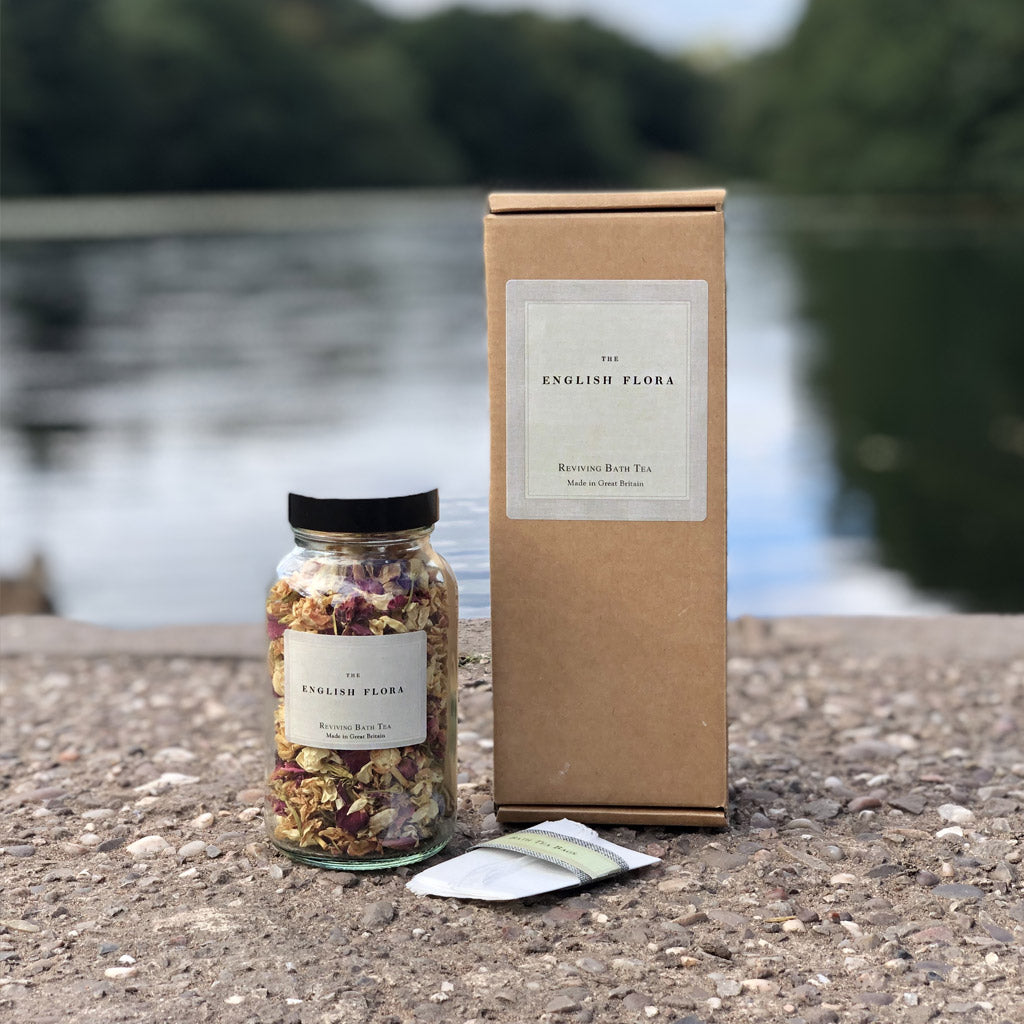 Natural flowers and herbs fill this jar of Reviving Bath Tea. Supplied with paper bags in a recyclable Kraft box, this gorgeous gift is a perfect pre-made care package for somebody you love, or a special treat to look forward to after a hard day.